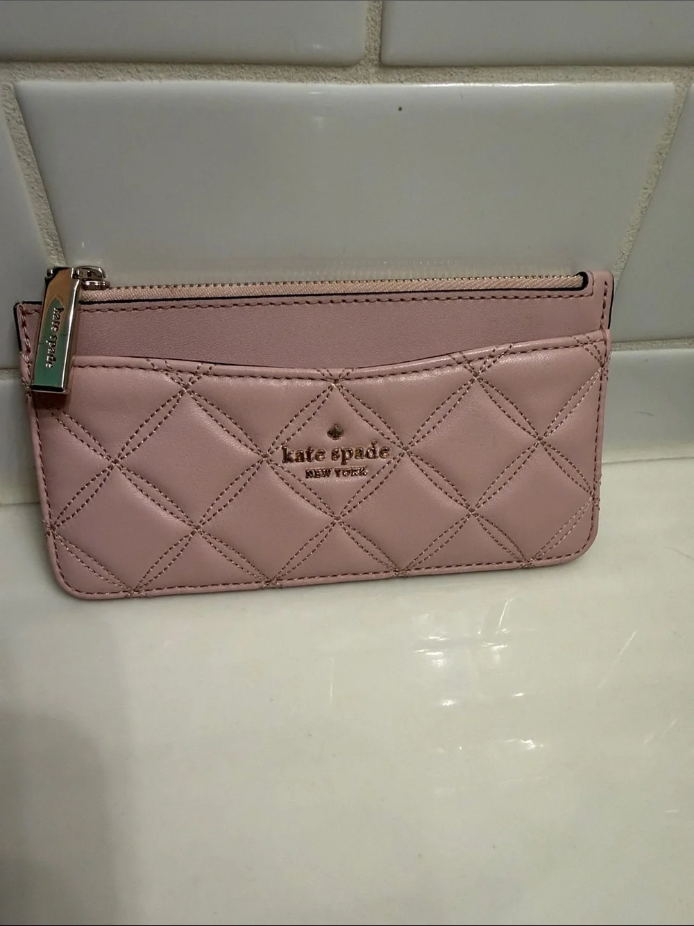 kate spade quilted blush pink card pouch with gold-tone zipper